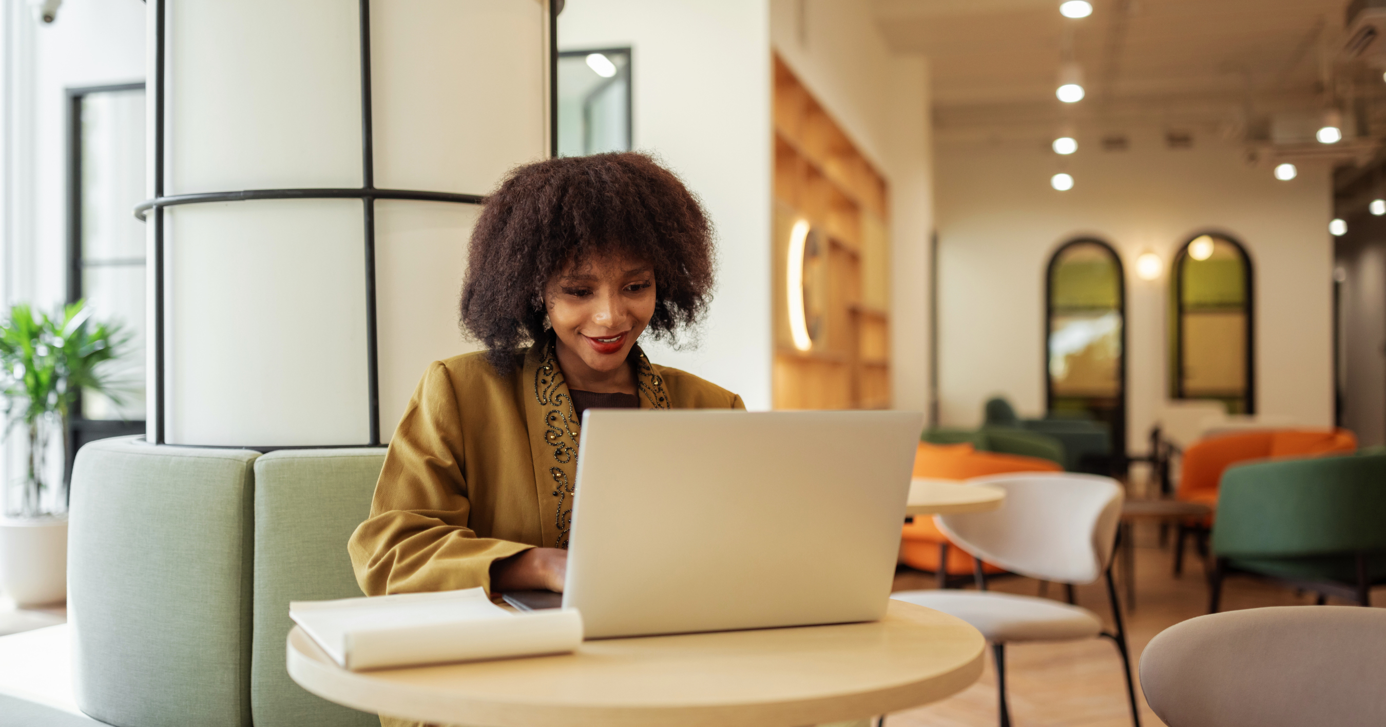 Woman Sitting with a laptop