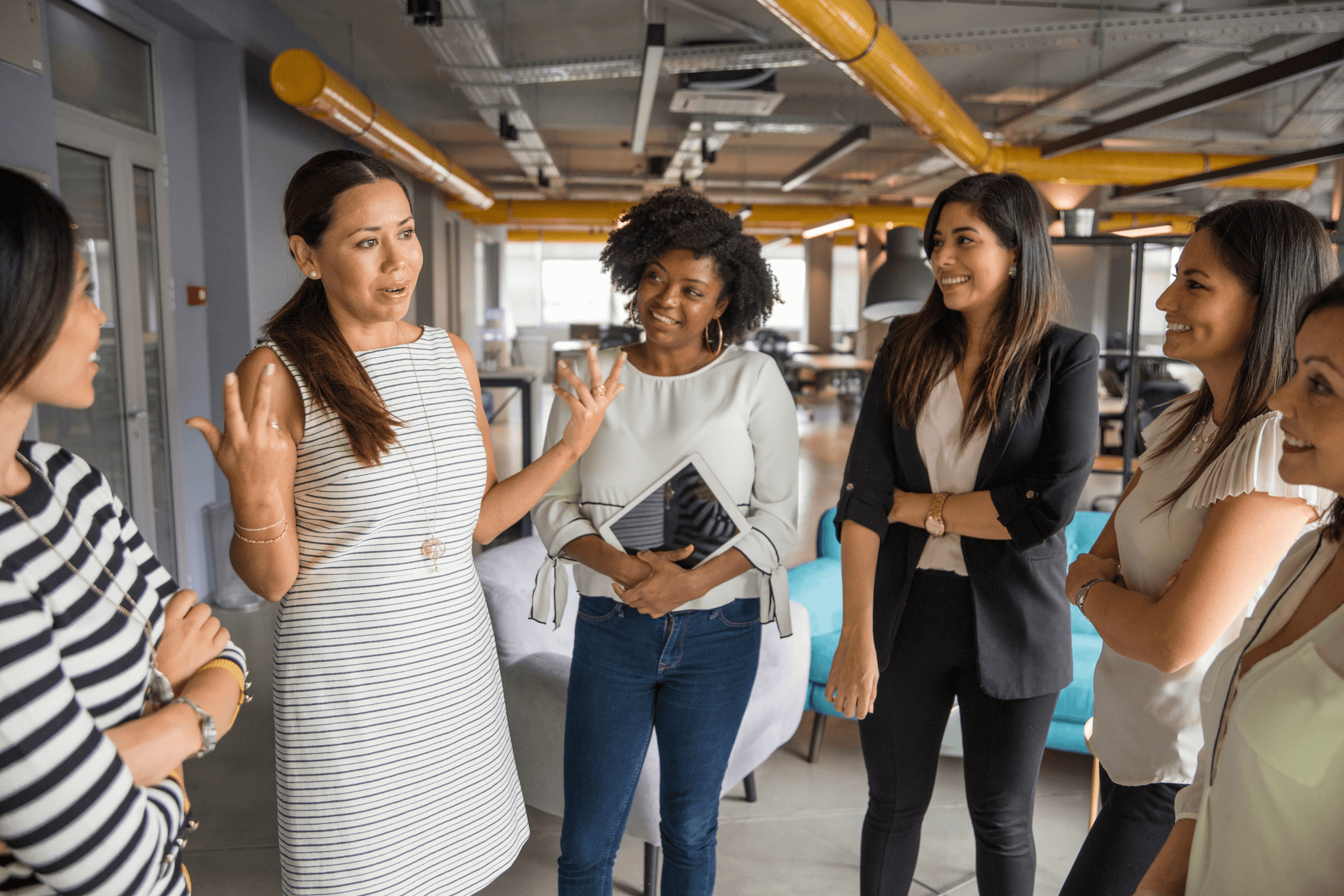 group-of-businesswomen-chat-in-modern-office-space
