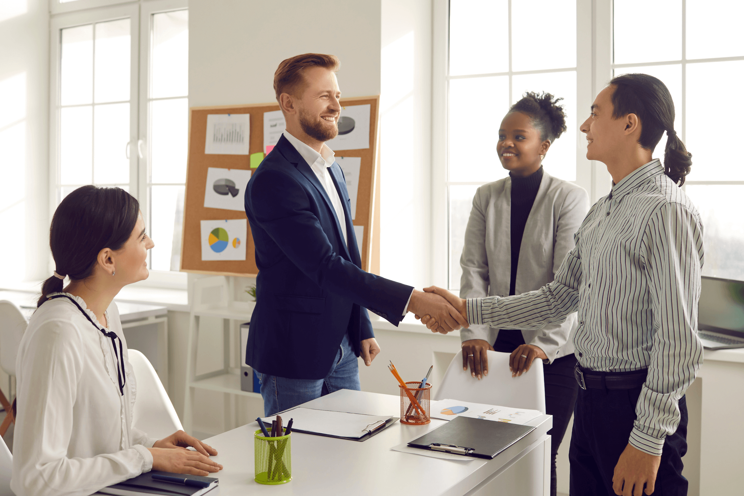 hiring-manager-shakes-job-candidates-hand-after-interview